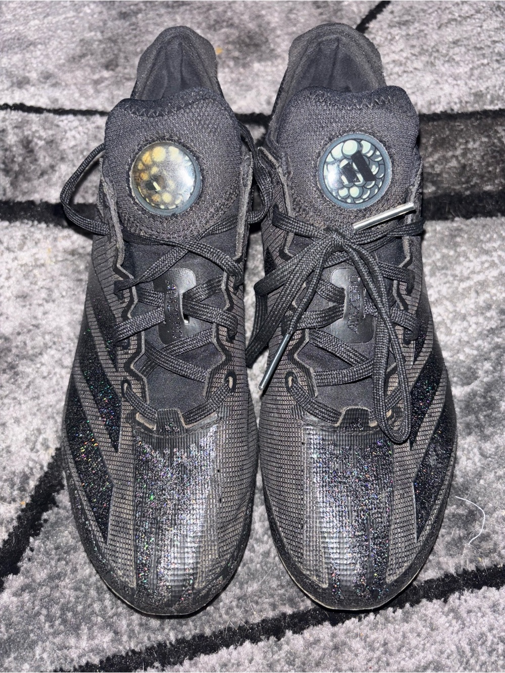 Black Adidas football cleats